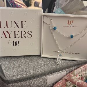 BP Silver Necklace with Blue Accents